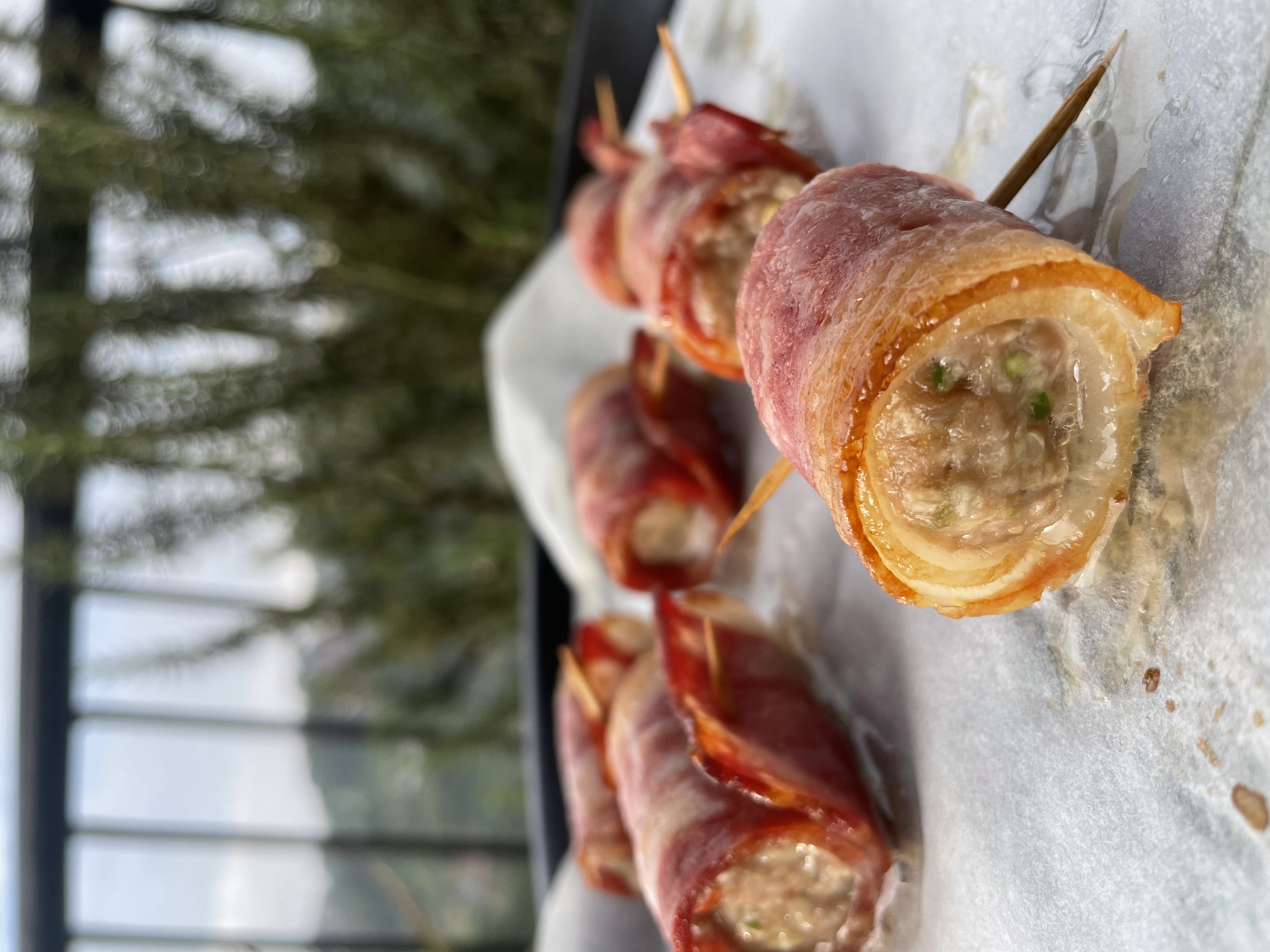 Crispy bacon rolls with dipping sauce